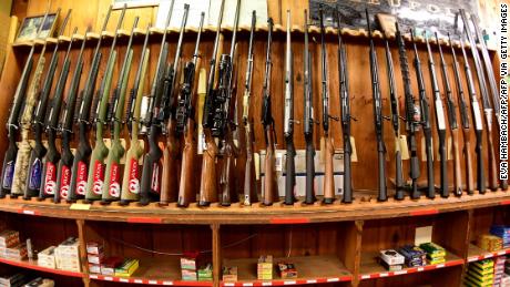 Various rifles on display at a gun store in Virginia on January 16, 2020.