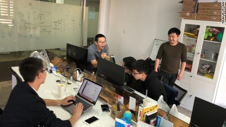 TravelFlan employees in Shanghai. The Hong Kong-based startup struggled to make ends meet last year before changing its strategy and winning new investment.