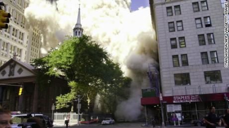 Dust and smoke enveloped St. Paul&#39;s Chapel as one of World Trade Center towers collapsed on September 11, 2001.