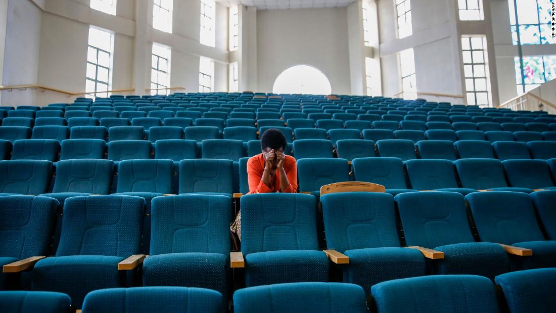 A woman attends a Sunday service at the Nairobi Baptist Church in Nairobi, Kenya, on March 22, 2020. The service was streamed live on the internet.