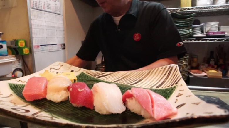 Japan coronavirus fish market sushi slump Essig pkg intl hnk vpx_00000506