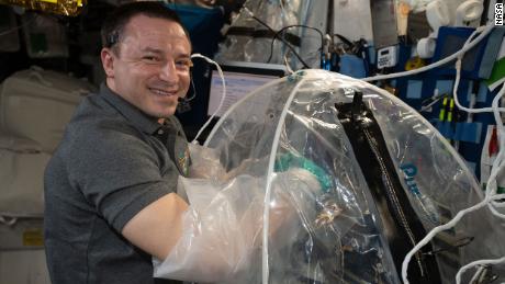 Morgan conducts cardiac research activities inside the portable glovebag. 