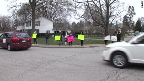 Teachers missing their elementary school students drove by their homes this week.