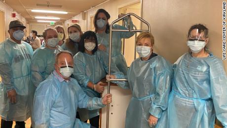 Staff at the Life Care Center in Kirkland, Washington, wear protective equipment after the outbreak was identified.