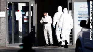 Members of the Spanish army&apos;s military emergency unit disinfect the Palacio de Hielo.