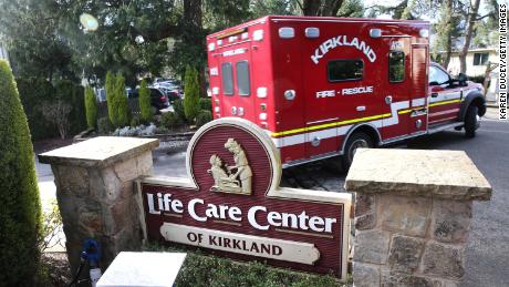 An ambulance leaves the Life Care Center on March 7, 2020, in Kirkland, Washington.