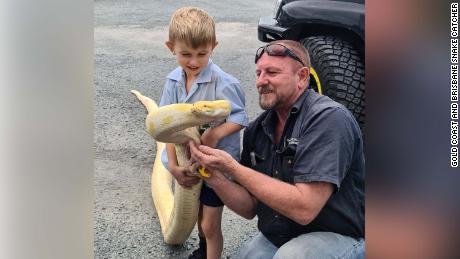 Harrison took his son Jensen to see the snake.