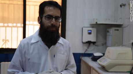 Dr. Mohammed Shahem Makki is the only person in Syria's rebel-held territories who can carry out tests. 