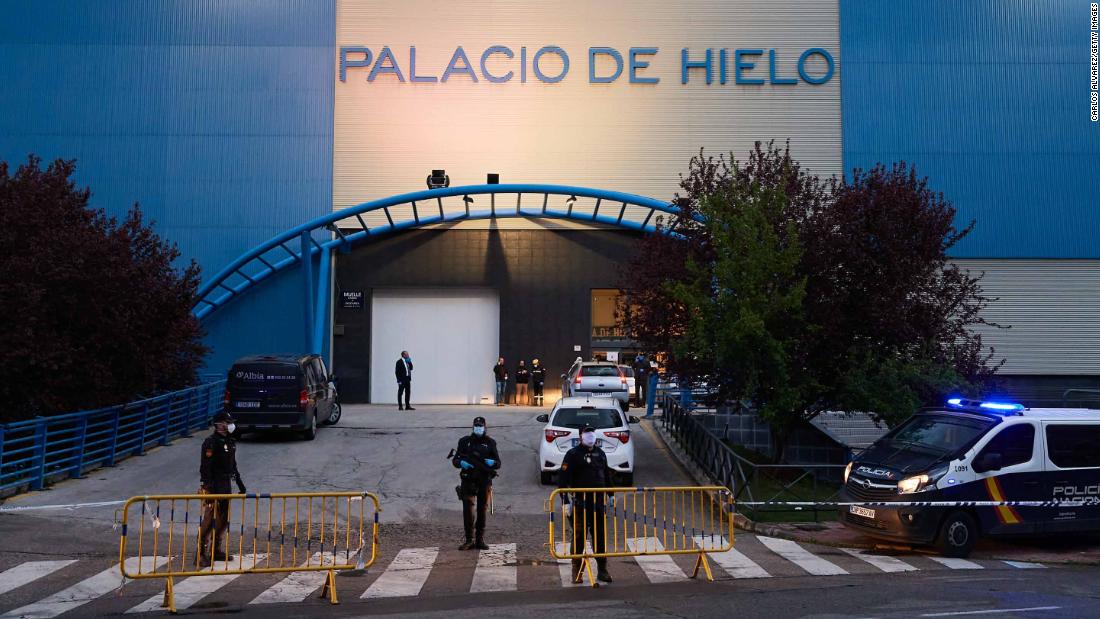 Authorities are seen in Madrid, where an &lt;a href=&quot;http://edition.cnn.com/2020/03/24/europe/spain-ice-rink-morgue-coronavirus-intl/index.html&quot; target=&quot;_blank&quot;&gt;ice rink has been converted into a makeshift morgue&lt;/a&gt; to cope with the coronavirus fallout.