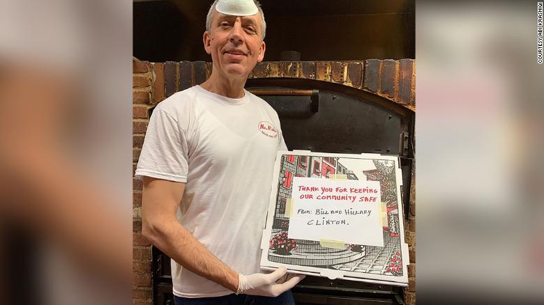 Nick Krasniqi of Mr. Nick&#39;s Brick Oven Pizza standing with one of the pizzas that were delivered to Phelps Memorial Hospital. 