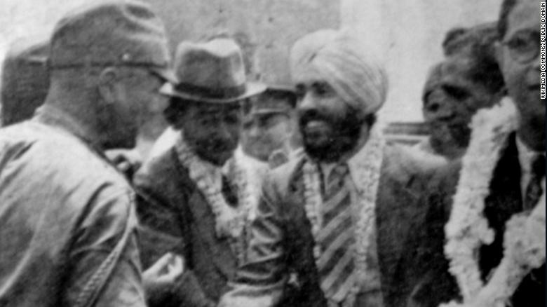 Japanese Major Fujiwara Iwaichi greets Captain Mohan Singh of the Indian National Army.