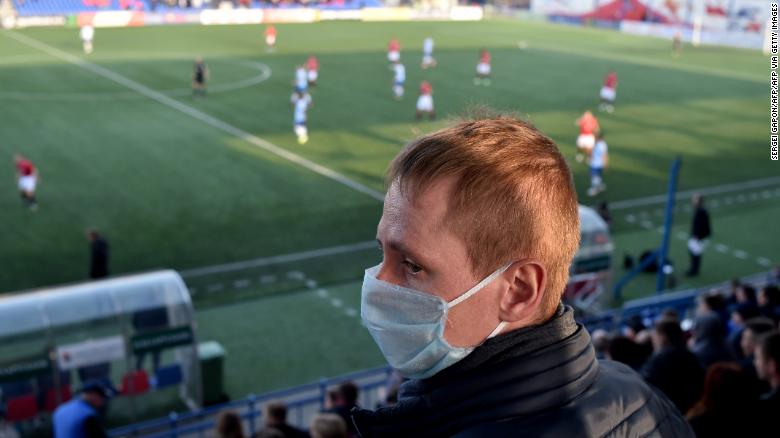 Few supporters wore protective face masks to the match.