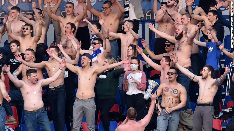 Many fans supported their team shirtless in the stands.