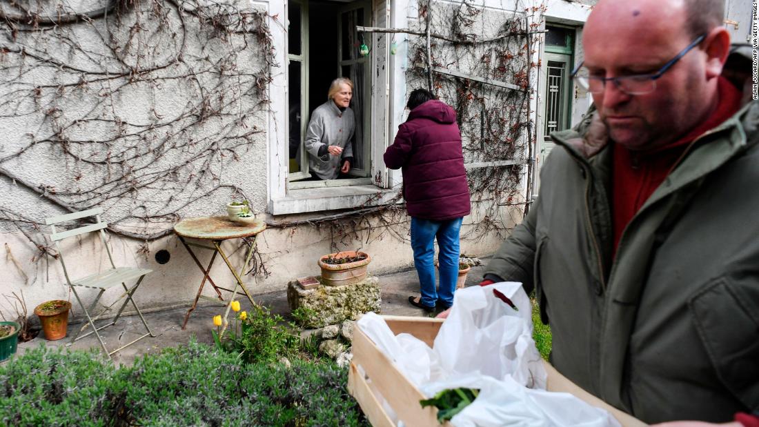 Farmers deliver vegetables to a customer in Saint-Georges-sur-Cher, France, on March 29, 2020.