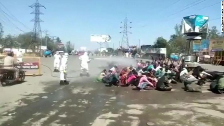 Videp showed the workers being doused in the chemical. 