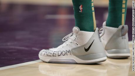 Kanter takes the court with the word &quot;freedom&quot; written on his shoes during the Boston Celtics away game against the Los Angeles Lakers on February 23.