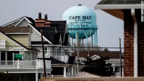 A water tower stands beyond residences in Cape May, New Jersey. 