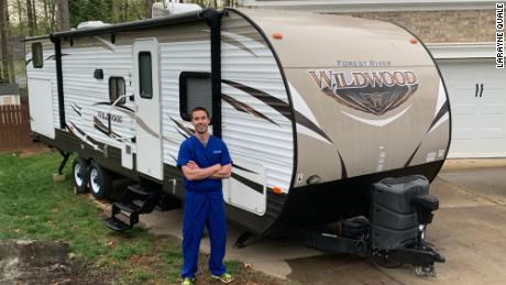 Mark Quale, an emergency physician, is able to isolate himself from his family thanks to Facebook group RVs for MDs. 