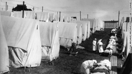 The 1918 flu pandemic killed 50 million people. These lessons could help avoid a repeat with Covid-19