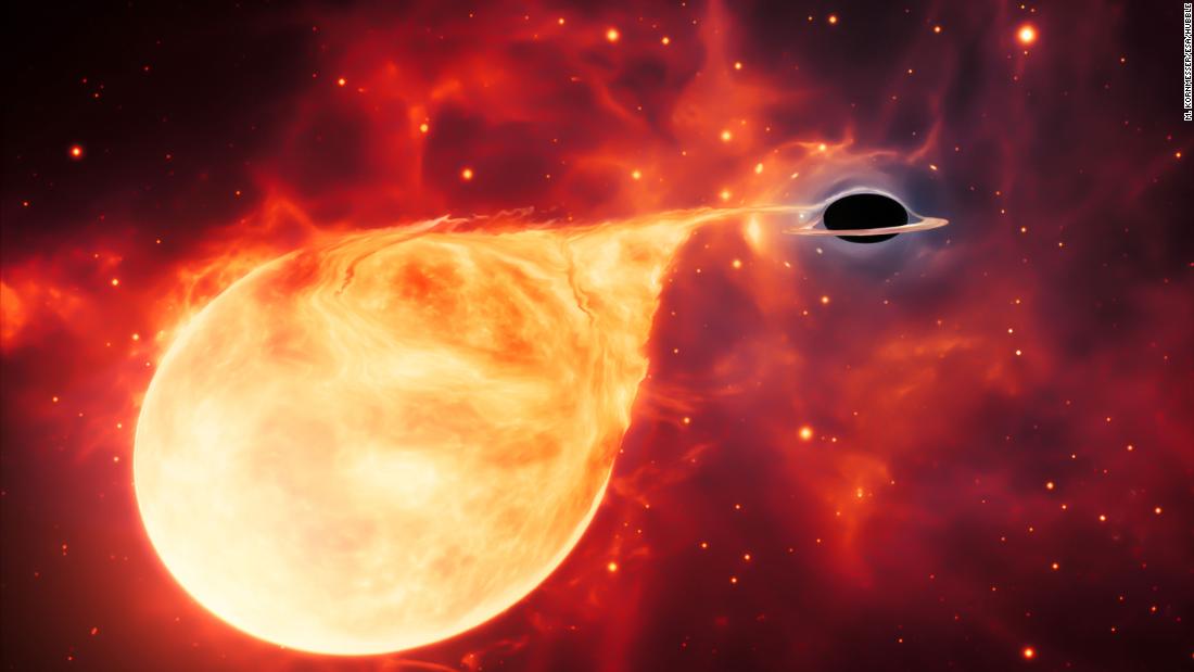 This artist&#39;s illustration shows an intermediate-mass black hole tearing into a star.