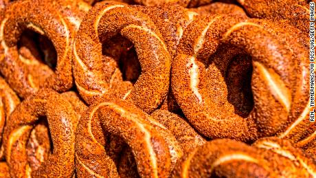 Simit is the most popular street food in Istanbul, Turkey. It is a circular bread decorated with sesame seeds. (Photo by: Ren_ Timmermans/VW Pics/Universal Images Group via Getty Images)