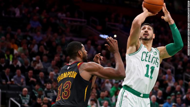  Enes Kanter #11 of the Boston Celtics takes a shot over Tristan Thompson #13 of the Cleveland Cavaliers during the first half at TD Garden on December 09, 2019 in Boston, Massachusetts. 
