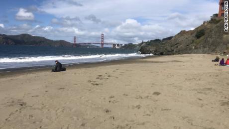 A near empty China Beach in view of the Golden Gate Bridge indicates that San Franciscans are abiding by the stay-at-home mandate.