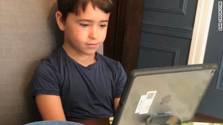 Second grader Jack Simon takes a class through Zoom, powered by Nutella on toast.