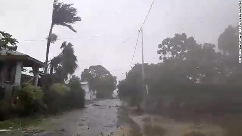 The storm blows through Luganville, Vanuatu on Monday.