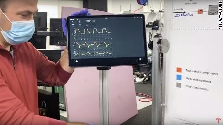 A Tesla engineer shows off a prototype ventilator that&#39;s made with a Tesla Model 3 display screen.