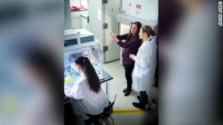 Professor Regina Lamendella, in the purple shirt, conducts research with two Juniata College students at the Contamination Source Identification (CSI) lab.