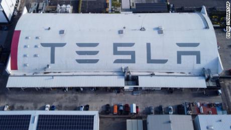 Tesla furloughs staff and slashes salaries as Covid-19 pandemic worsens 