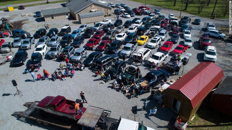 Pastor Greg Locke of Global Vision Bible Church in Mount Juliet, Tennessee, holds services in the church parking lot.