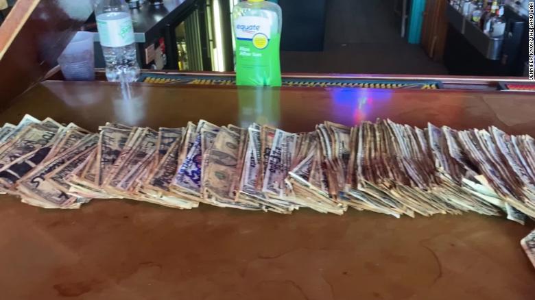 Georgia Bar Pays Unemployed Staff With Dollar Bills Stapled To Walls