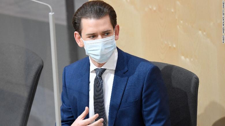 Austria&#39;s Chancellor Sebastian Kurz wears a protective mask as he arrives for a special session of the National Council on April 3 in Vienna.