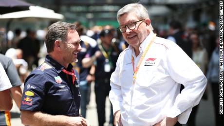 Brawn chats with Red Bull Racing Team Principal Christian Horner.