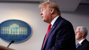 President Donald Trump speaks about the coronavirus in the James Brady Press Briefing Room of the White House, Thursday, April 9, 2020, in Washington, as Vice President Mike Pence listens. 