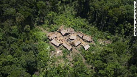 The 15-year-old boy from the Yanomami indigenous tribe lived in a remote village such as this one. 