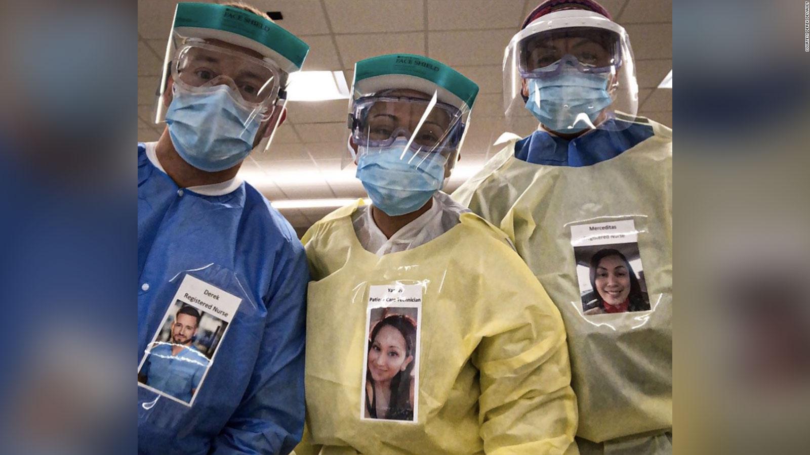 Health care workers are wearing smiling photos of themselves to put