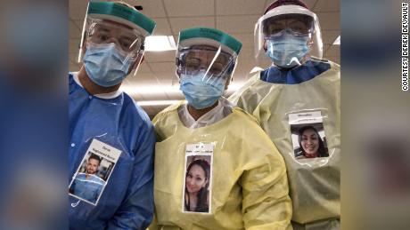 Healthcare workers wearing photos of themselves outside of their PPE to help put patients at ease.