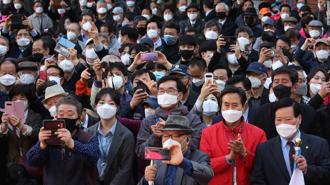 People in Seoul, South Korea, listen to a speech from Hwang Kyo-ahn, who is campaigning for the upcoming &lt;a href=&quot;http://edition.cnn.com/2020/04/13/asia/elections-coronavirus-pandemic-intl-hnk/index.html&quot; target=&quot;_blank&quot;&gt;parliamentary elections.&lt;/a&gt;