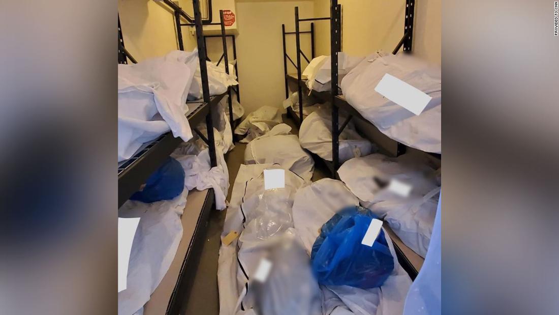 Photos show bodies piled up and stored in vacant rooms at Detroit hospital  | CNN