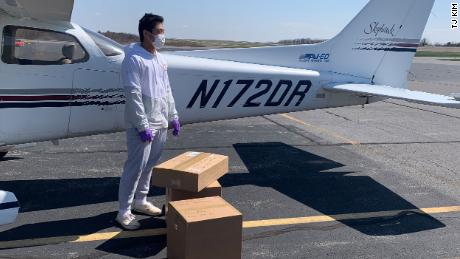 Kim loading a Cessna with supplies destined for a rural hospital in Virginia. 