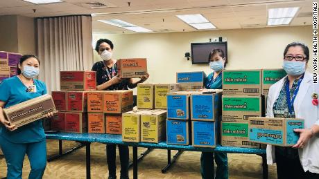 girl scout scout cookie delivery at NYC hospital during the Covid-19 crisis