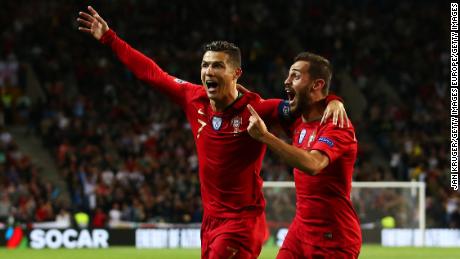 PORTO, PORTUGAL - JUNE 05:  Cristiano Ronaldo of Portugal celebrates after scoring his team&#39;s second goal with Bernardo Silva during the UEFA Nations League Semi-Final match between Portugal and Switzerland at Estadio do Dragao on June 05, 2019 in Porto, Portugal. (Photo by Jan Kruger/Getty Images)
