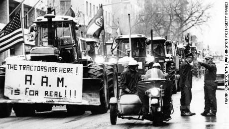 Tractors line up on 15th Street in Washington as  police attempt to keep order on February 16, 1979.