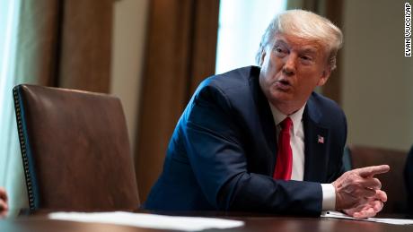 President Donald Trump speaks during a meeting with people that have recovered from COVID-19, in the Cabinet Room of the White House, Tuesday, April 14, 2020, in Washington. (AP Photo/Evan Vucci)