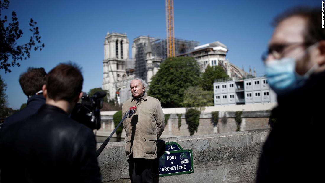 French Army General Jean-Louis Georgelin, head of Notre Dame Cathedral&#39;s reconstruction, speaks to journalists in Paris on April 14. Work at the Paris site has been suspended since March 16, when France introduced widespread measures to help control the spread of Covid-19.