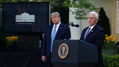 US President Donald Trump (L) listens as US Vice President Mike Pence speaks during the daily briefing on the novel coronavirus, which causes COVID-19, at the White House on April 15, 2020, in Washington, DC. (Photo by MANDEL NGAN / AFP) (Photo by MANDEL NGAN/AFP via Getty Images)