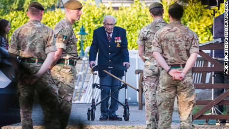 War veteran &#39;Captain Tom,&#39; 99, raises $15 million for NHS as he completes garden challenge